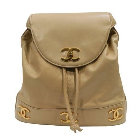 CHANEL Handbags - CHANEL CC Vintage Lambskin Beige Gold Backpack Bag Drawstring Chain